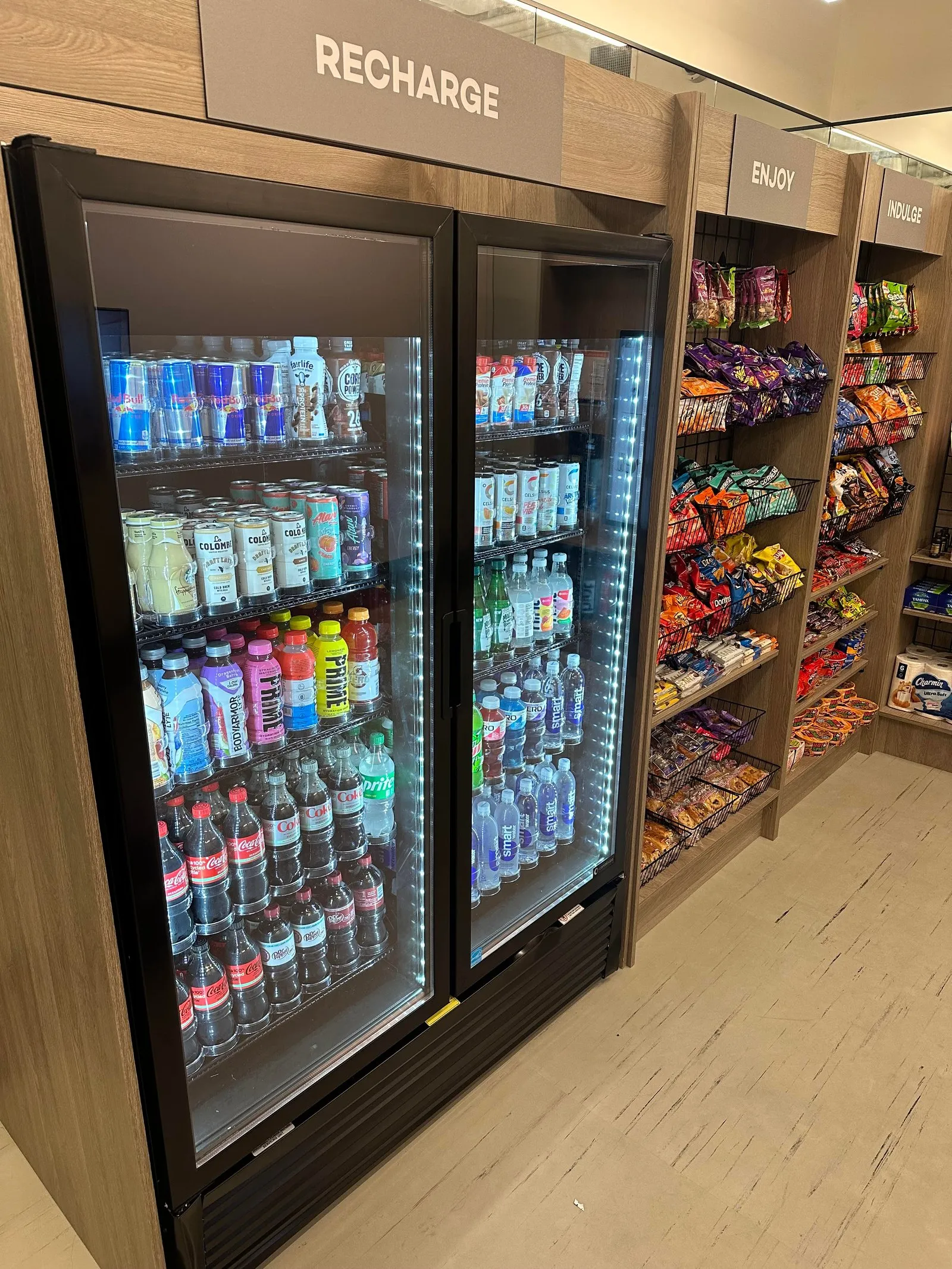 A custom Amenity Now office micro market featuring a self-checkout kiosk and smart coolers filled with fresh food in Charlotte, NC